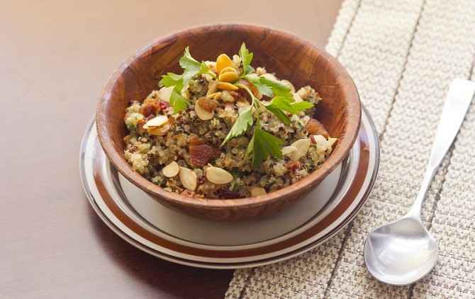 Healthy nutty Quinoa and Bacon Salad with toasted sliced almonds and parsley