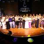 8-estilistas-e-modelos-reunidos-no-palco