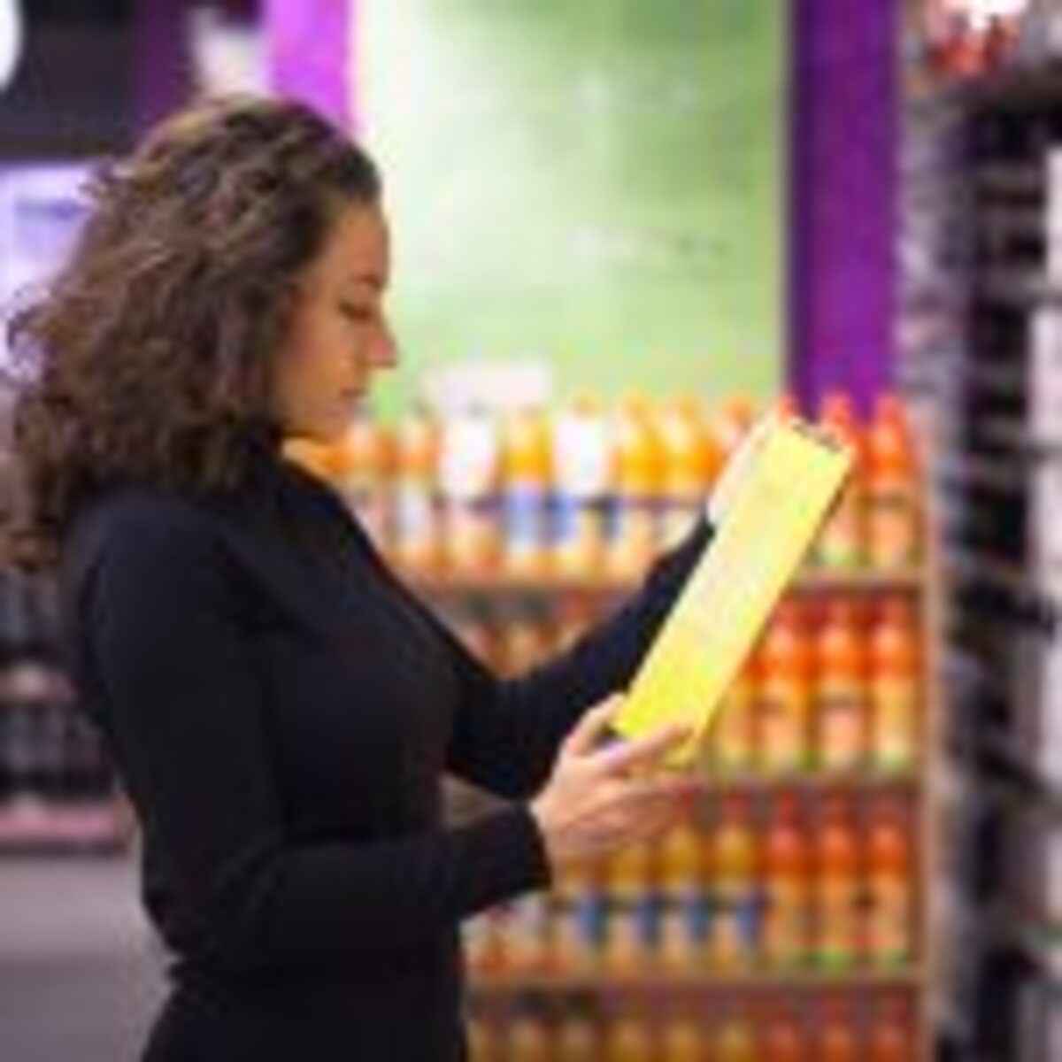Young woman shopping in the supermarket