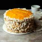 Uruguayan cake chaja: the famous sponge cake from Uruguay,  sponge cake stuffed with syrup, dulce de leche, whipped cream and peaches.