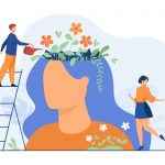 Tiny people and beautiful flower garden inside female head