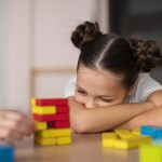 little-girl-doing-speech-therapy-clinic