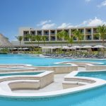 5-Zemi-Miches-Punta-Cana-All-Inclusive-Resort-Curio-Collection-by-Hilton-Pool-Lounges
